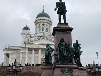 A statue of Alexander II (1894) stands in the middle of the Senate Square. Helsinki .  The Senate Square and its surroundings form a unique and cohesive example of Neoclassical architecture. The square is dominated by four buildings designed by Carl Ludvig Engel (1778-1840): Helsinki Cathedral, the Government Palace, the main building of the University of Helsinki and the National Library of Finland.