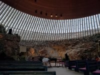 Temppeliaukio Church (inside) -The inside is bathed in a glorious natural light that enters through the glazed dome. It has a shallow circular dome (13 meters high) of copper sheeting and glass borne on concrete ribs.